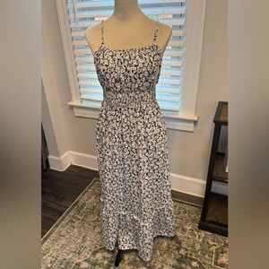 Sun dress with pockets and nice weight cloth.